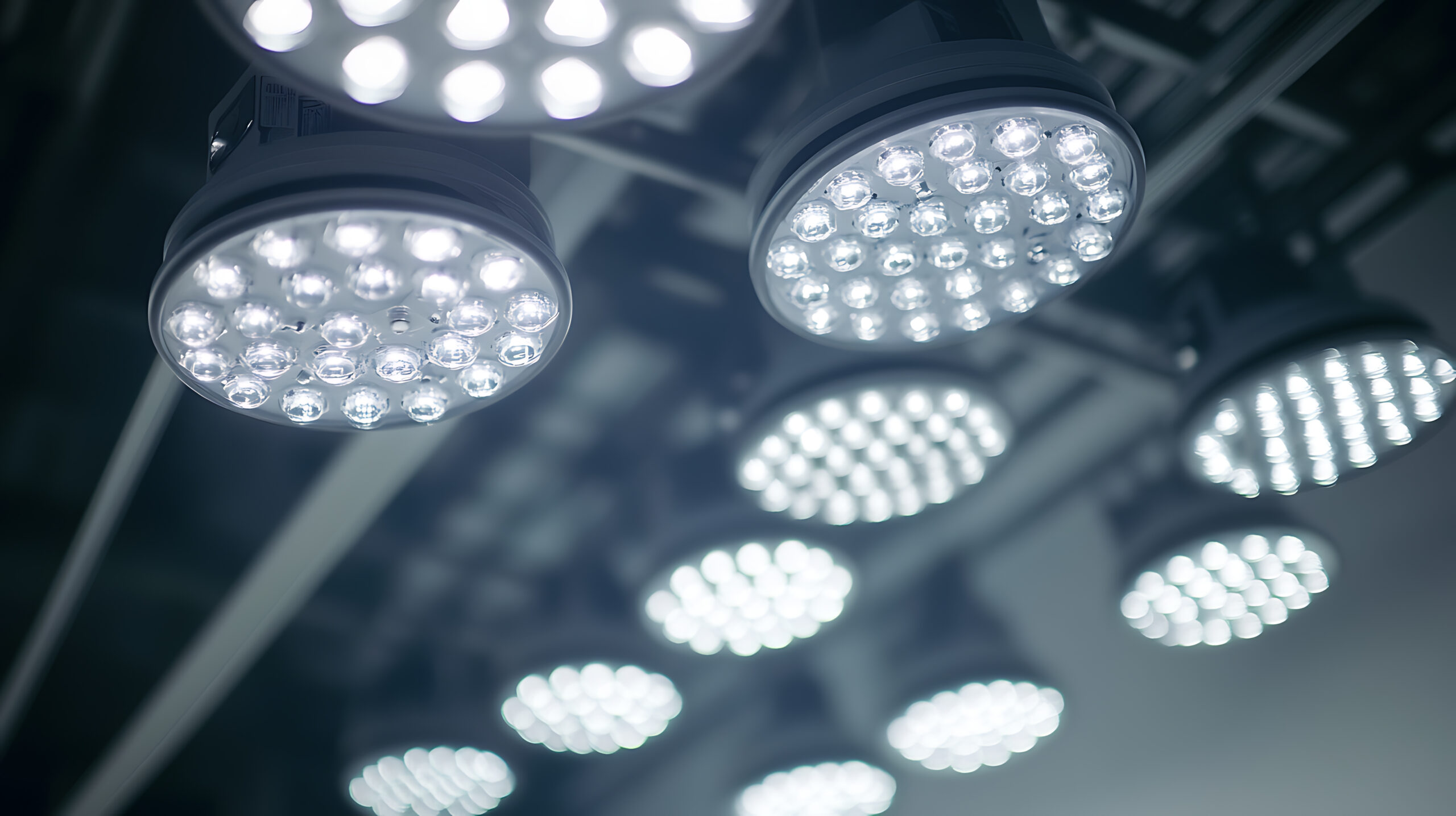 Electrician installing LED lights in an office space Featuring lighting installation and office renovations