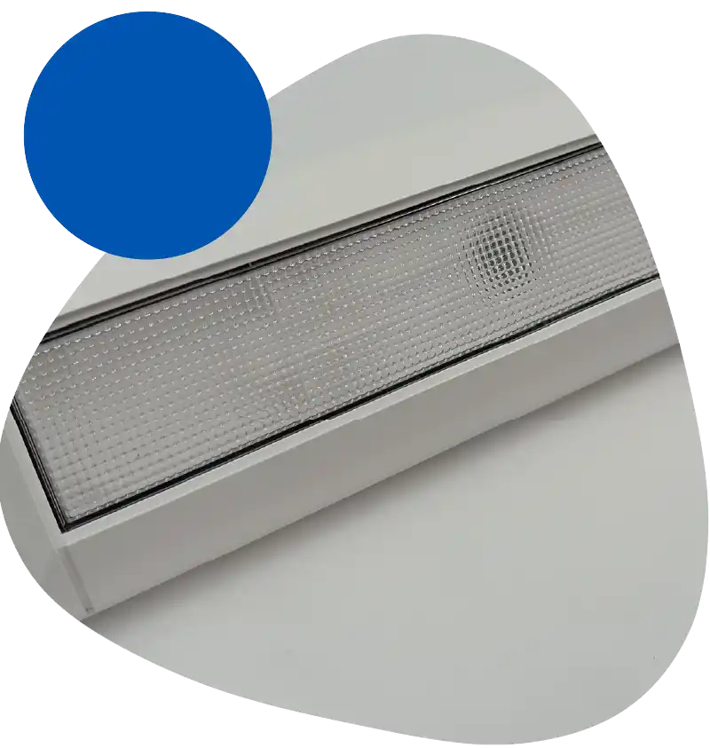 Rectangular ceiling light fixture with a diffused panel and frosted cover on a white ceiling