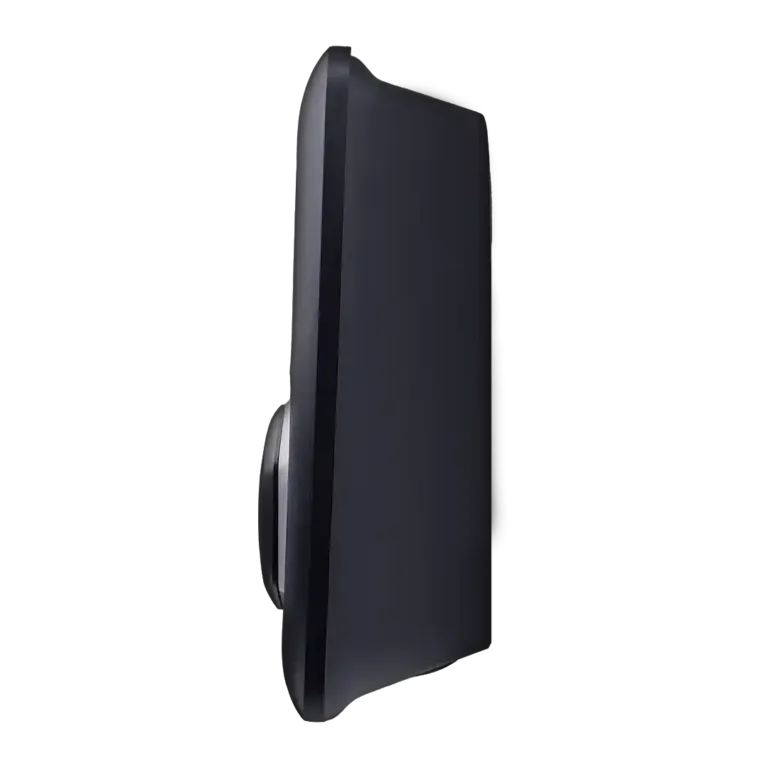 Side view of a black flat-screen monitor with a circular stand base behind it
